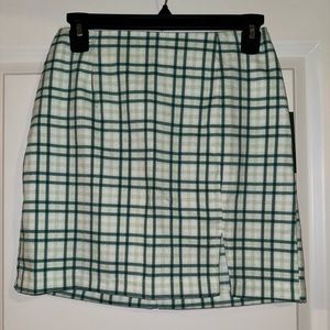 Never worn. Size 4 green and white skirt target